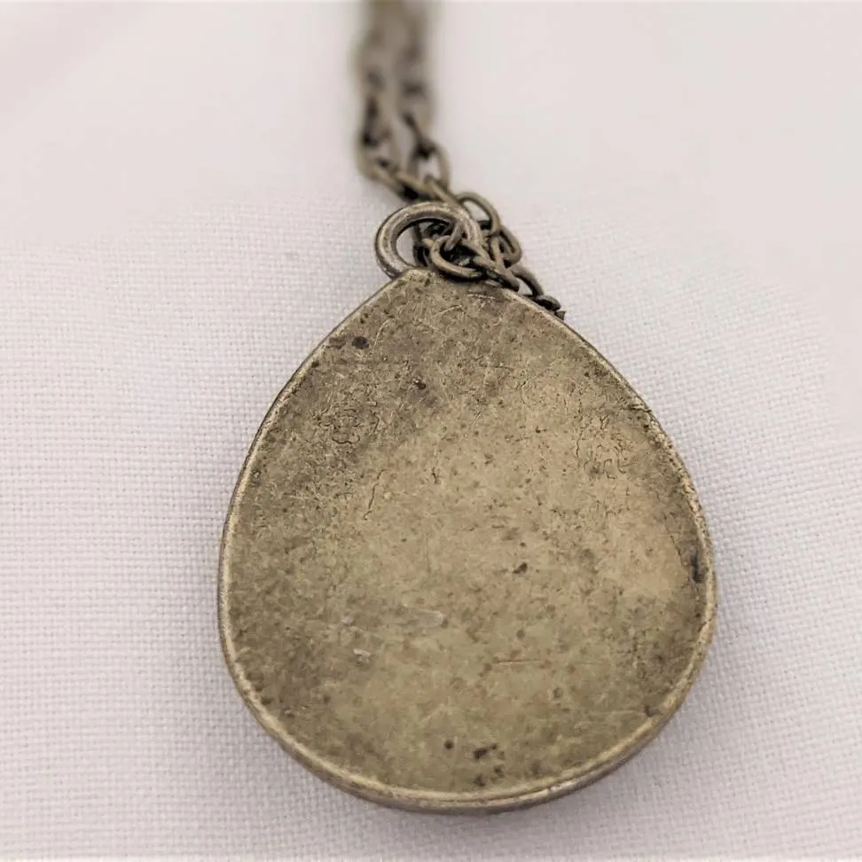 Embroidered roses teardrop pendant