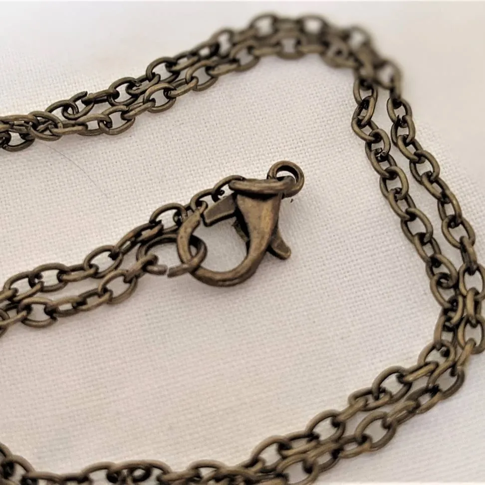 Embroidered roses teardrop pendant