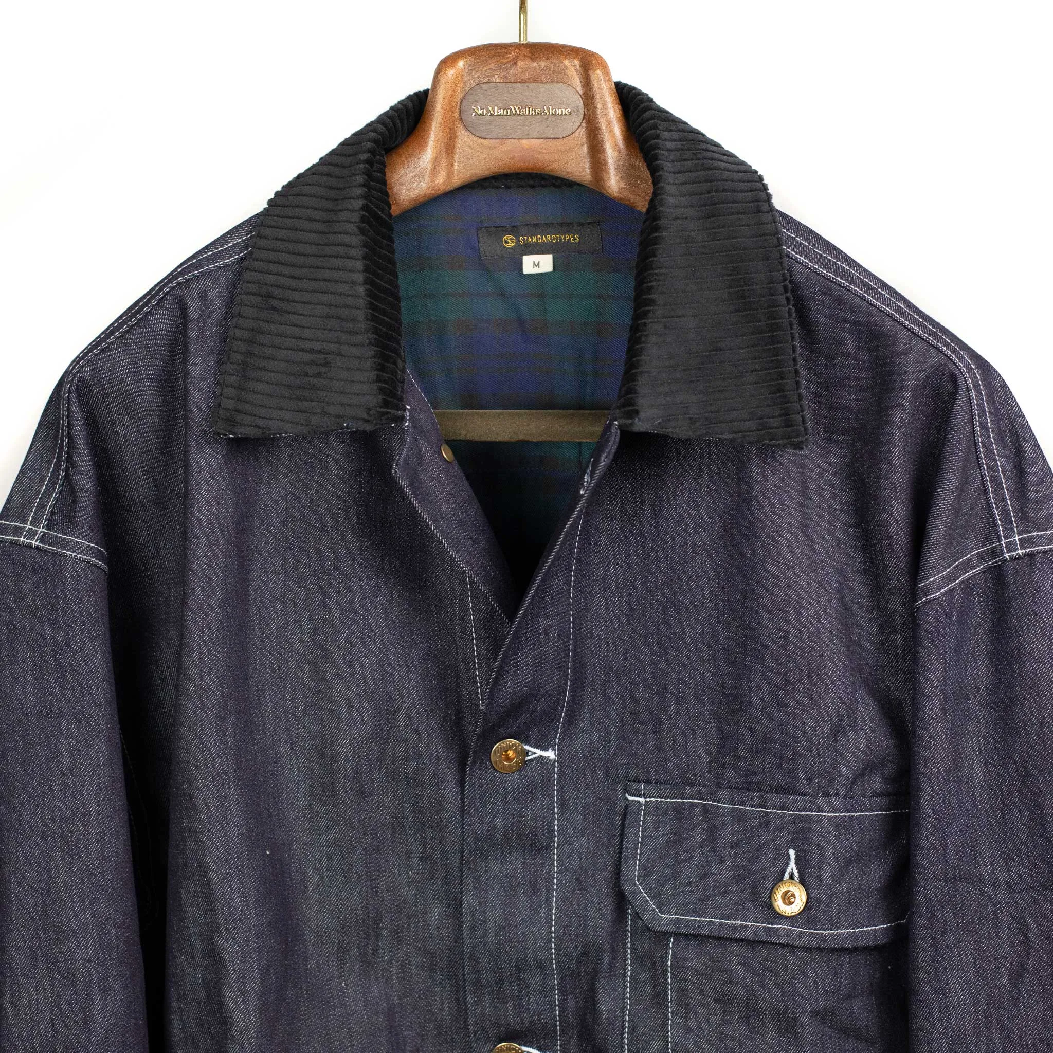Military trucker jacket in rinsed cotton denim