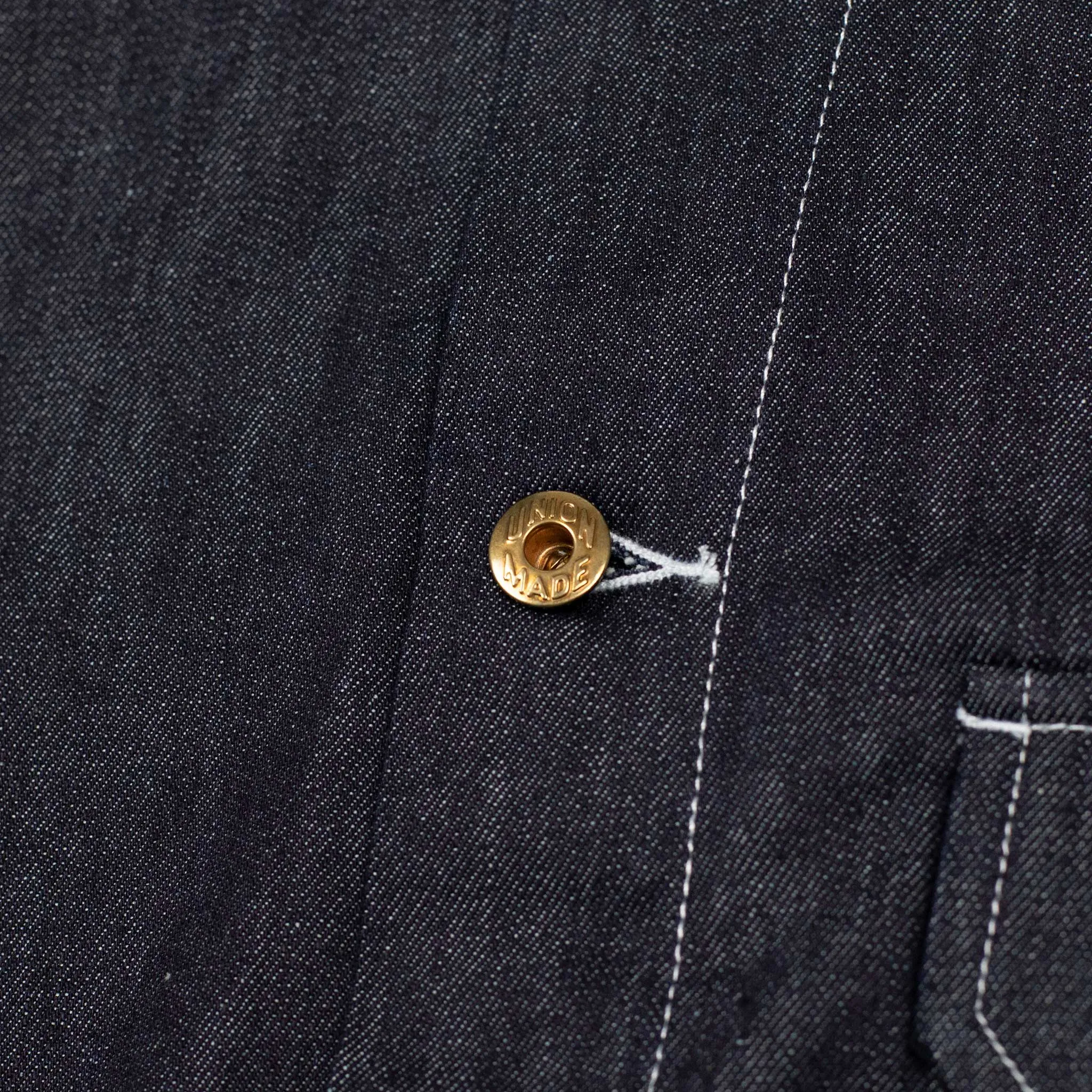 Military trucker jacket in rinsed cotton denim