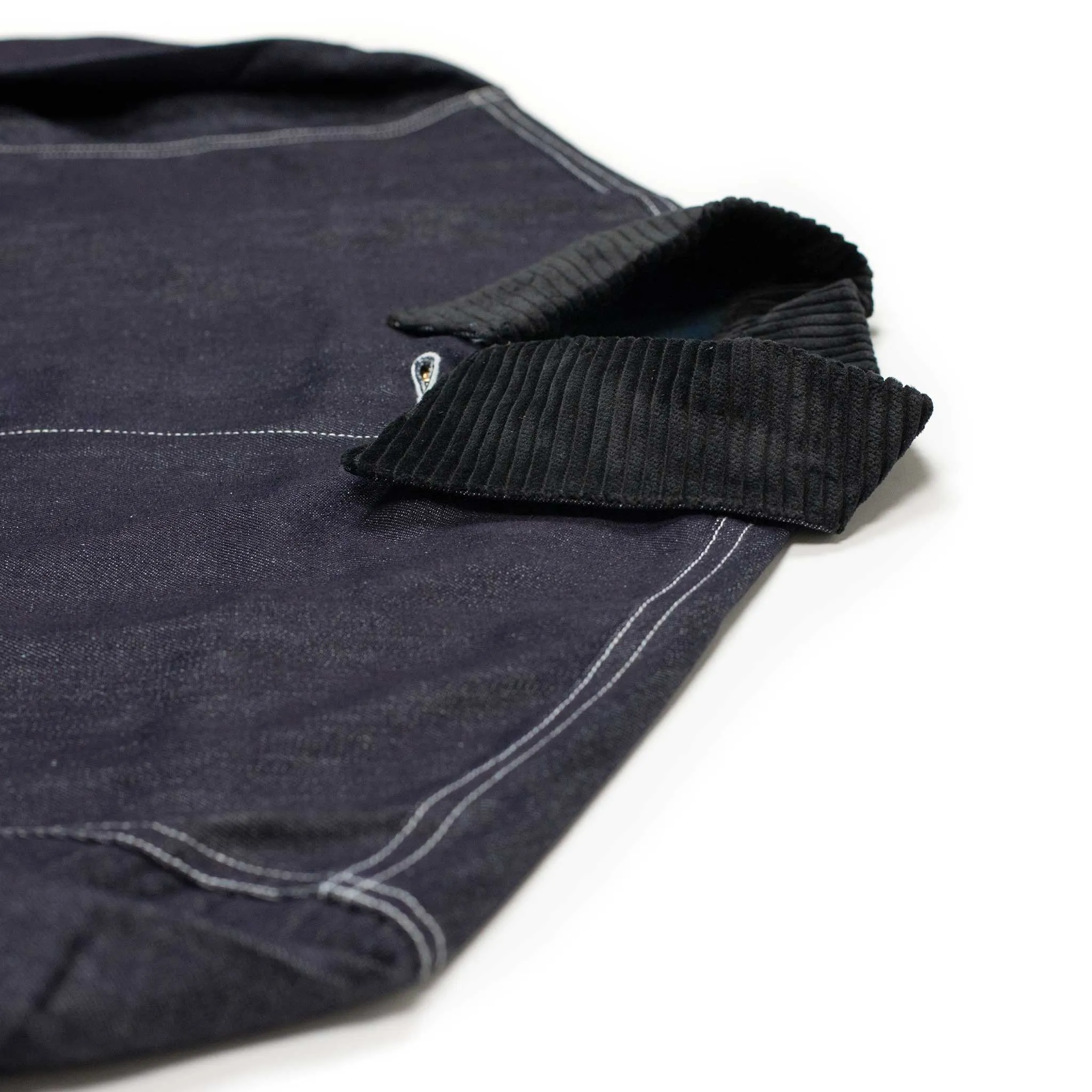 Military trucker jacket in rinsed cotton denim