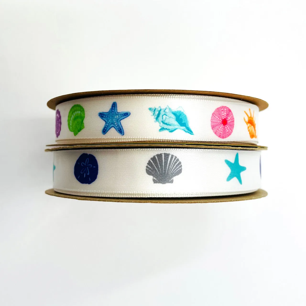 Seashells ribbon with Starfish and Sand Dollars in navy, turquoise and gray printed on 5/8"  white Single Face Satin Ribbon